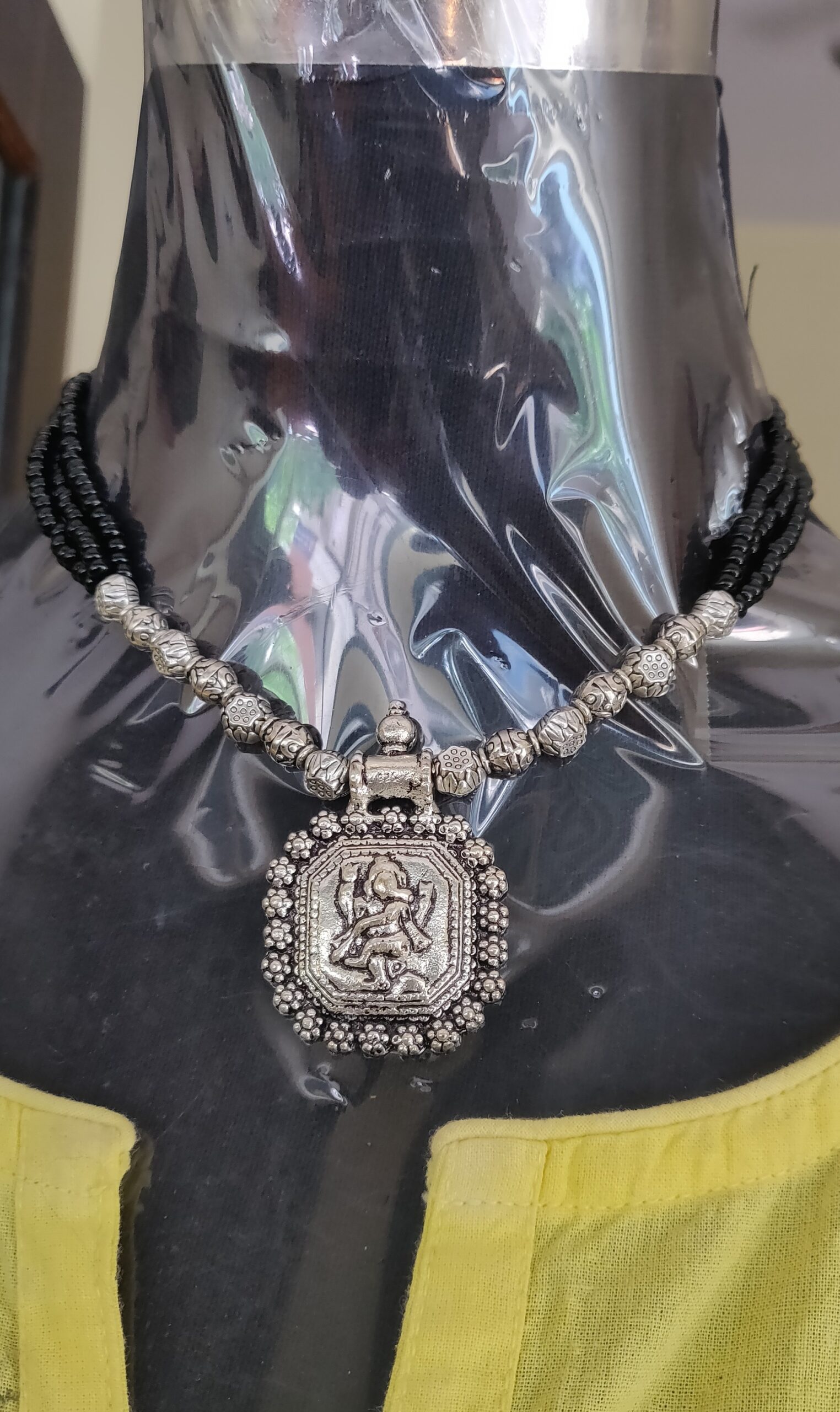 Multi layer black beads necklace with silver beads and pendant