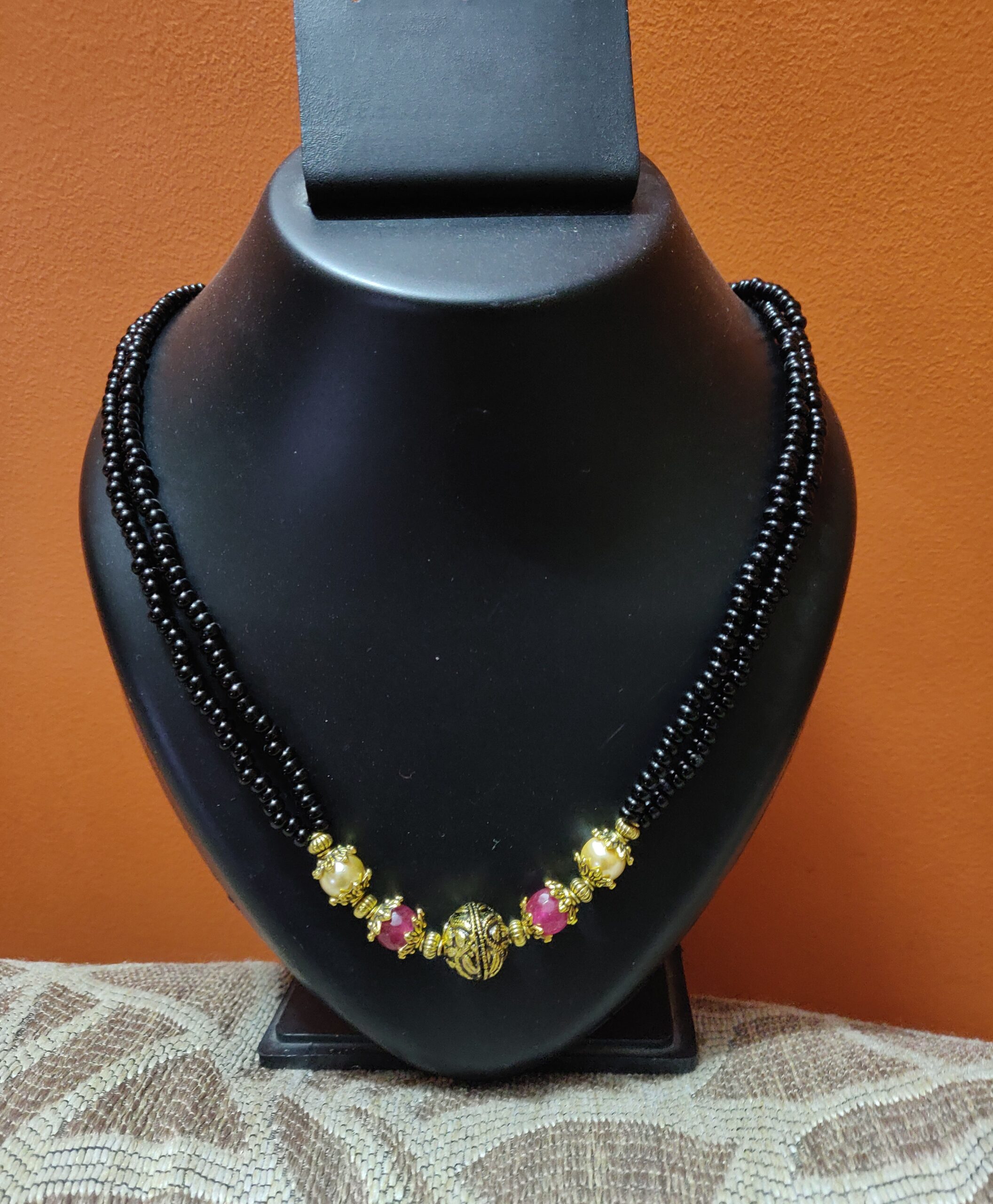 Black beads necklace with pearls and semi precious stones