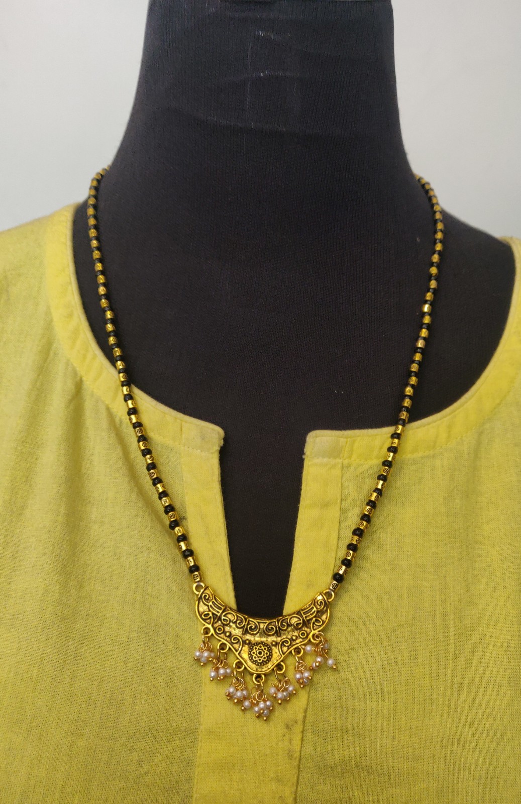Black beads long chain with brass pendant