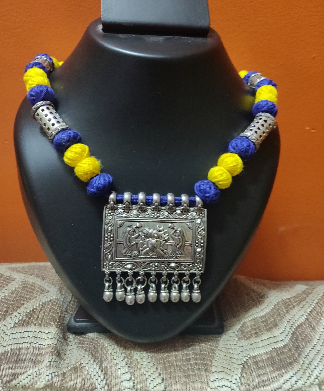 Blue and yellow cotton balls thread necklace