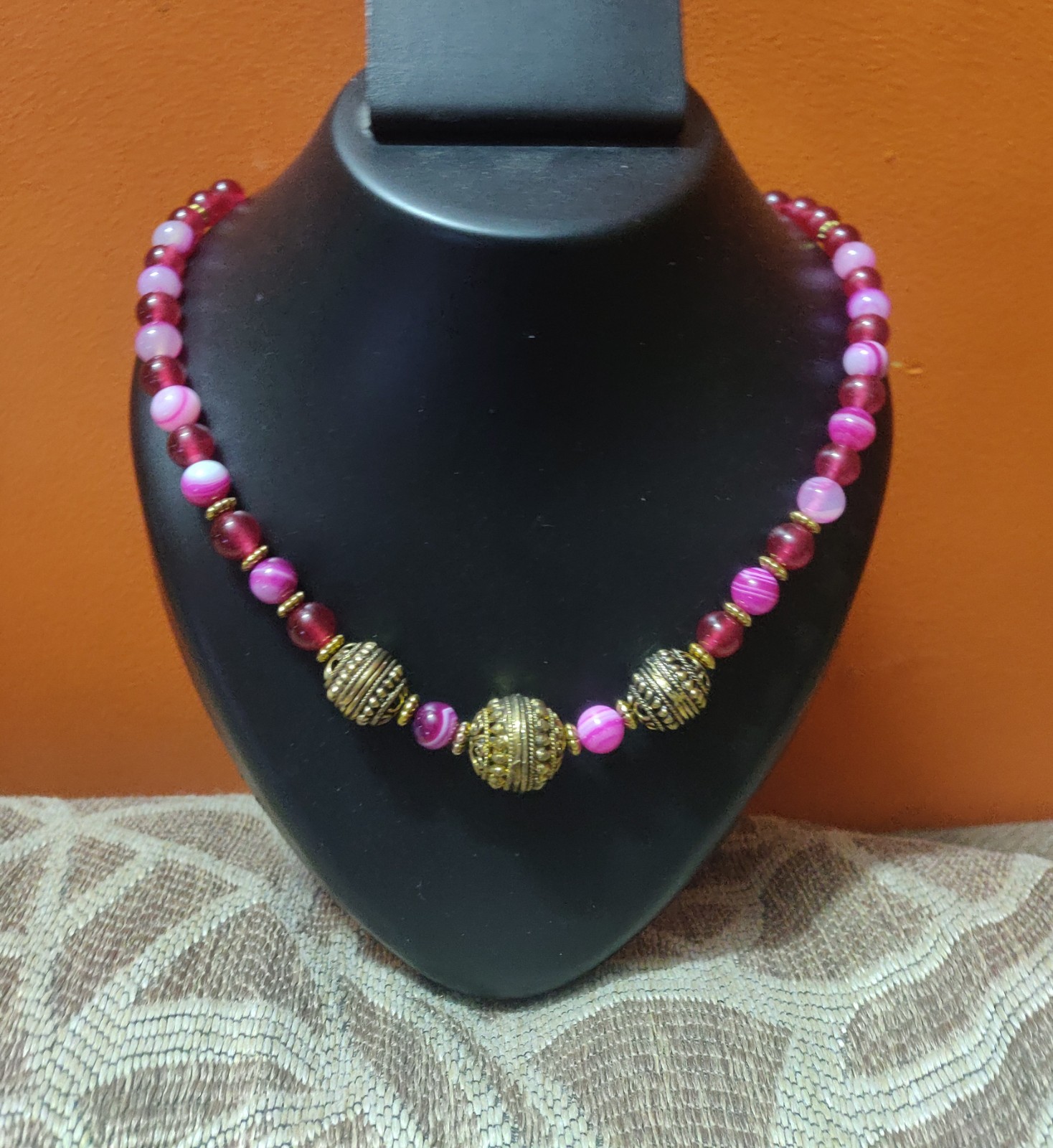 Semi precious beads in pink shaded with brass beads necklace