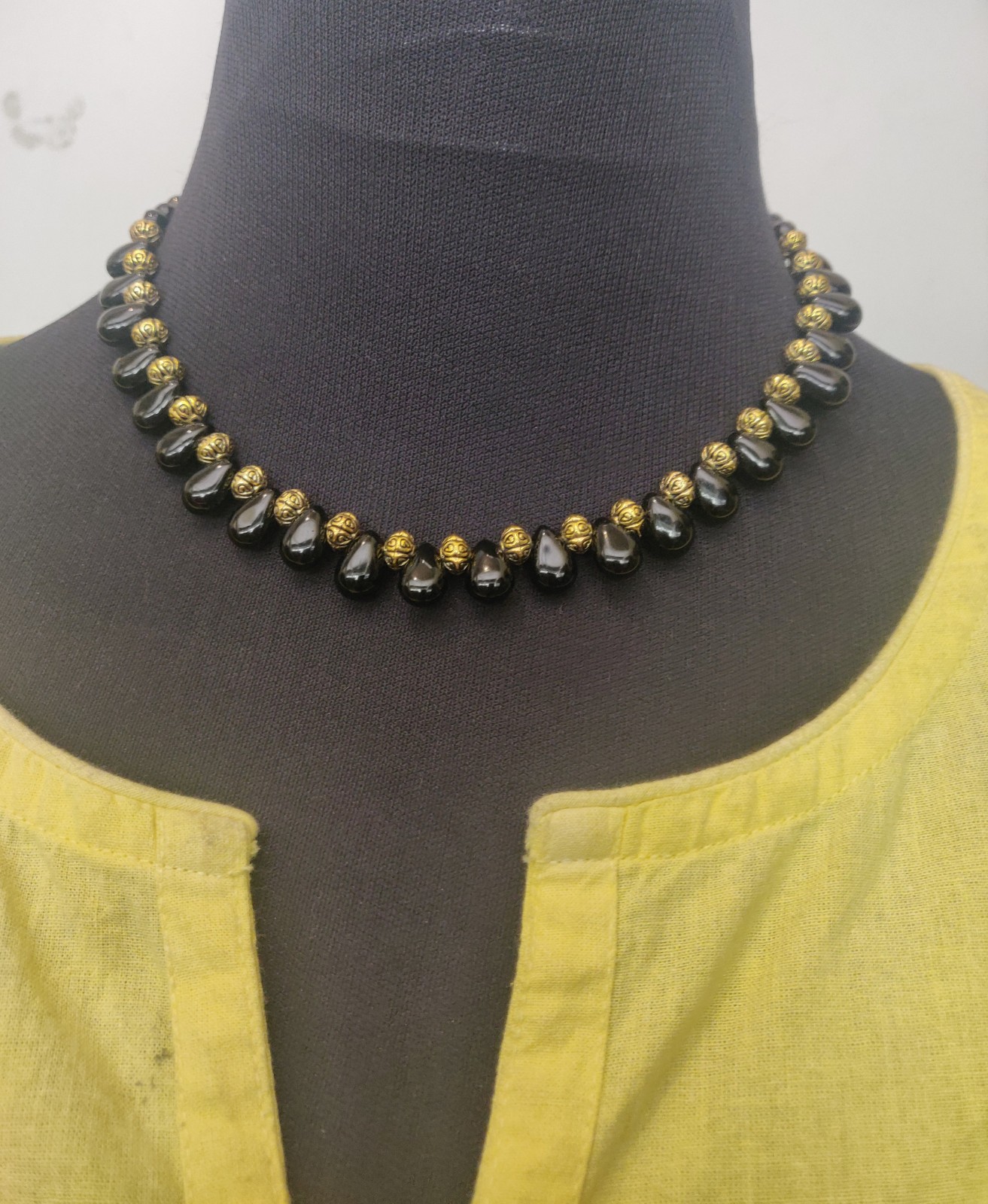 Drop shape black beads with brass beads necklace