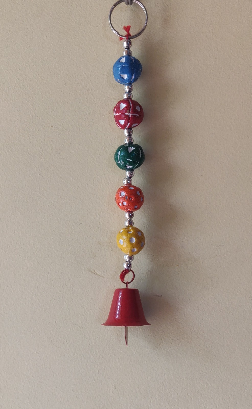 Five Handmade wooden Beads string with metal bell