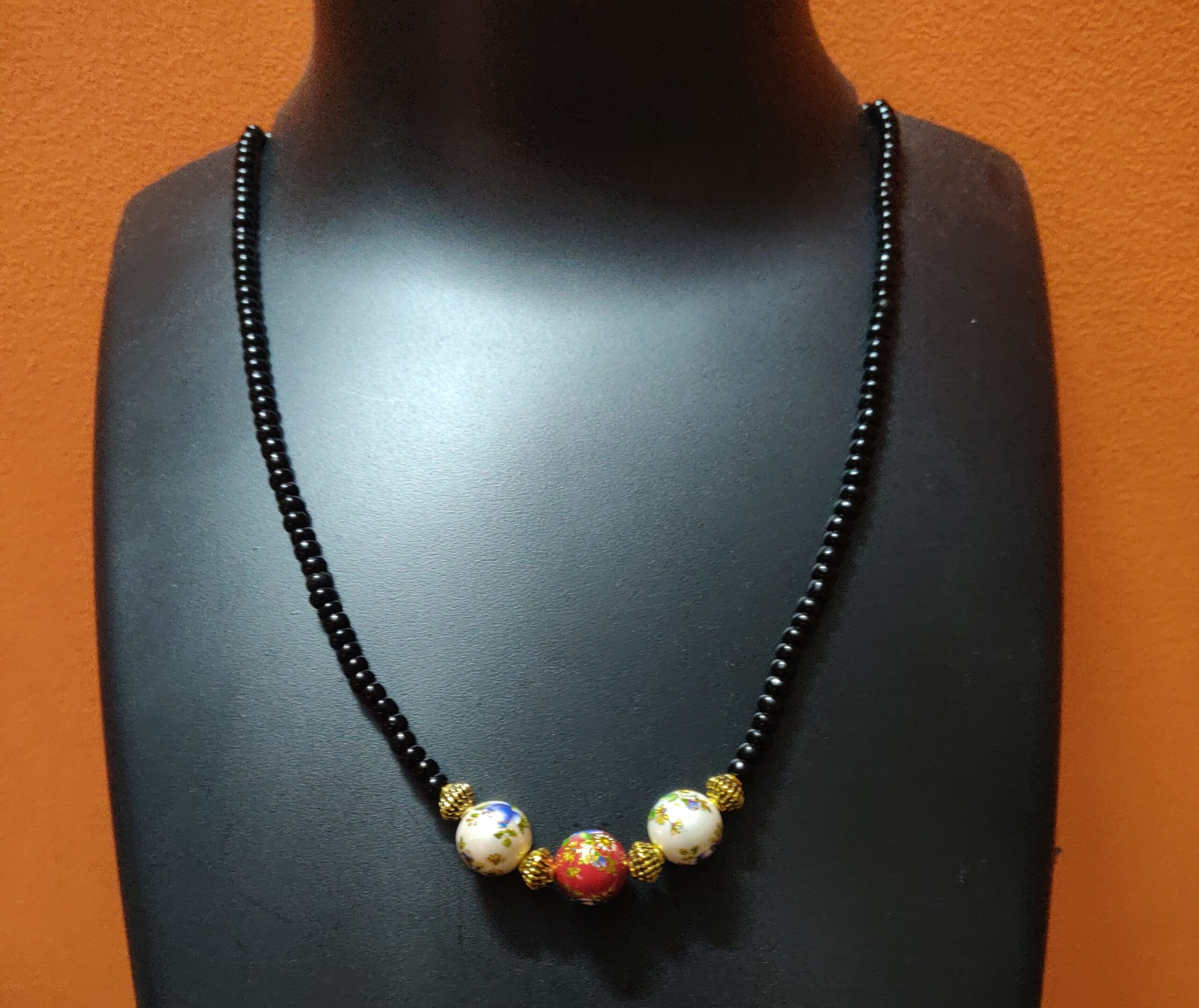 Black beads and hand painted beads necklace