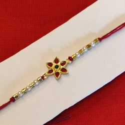 Handmade Rakhi with metal flower