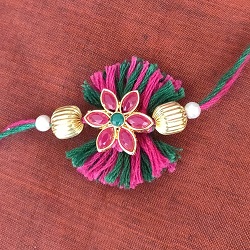 Thread and metal flower rakhi