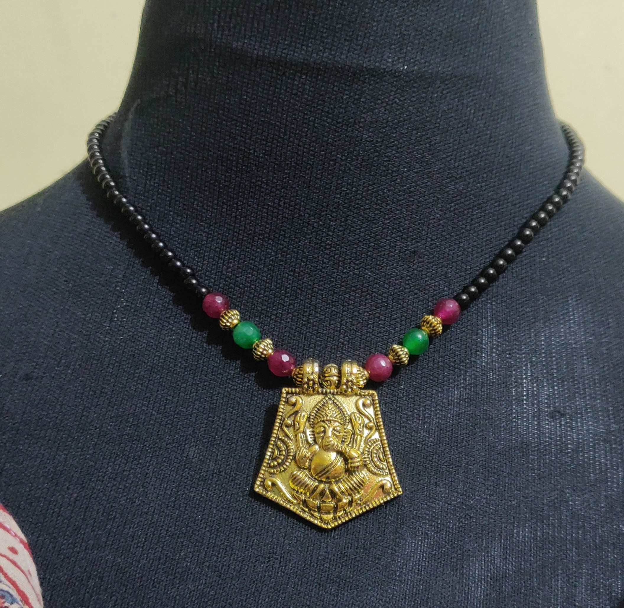Semi precious black beads with Ganesha brass pendant necklace