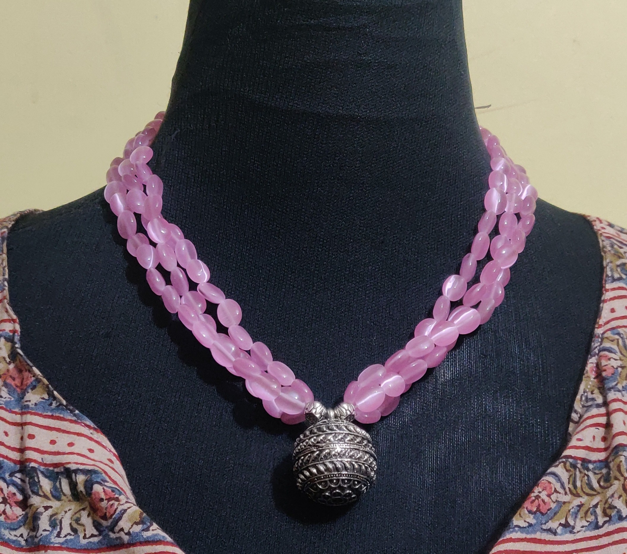 Layered Monalisa beads and antique bell pendant necklace