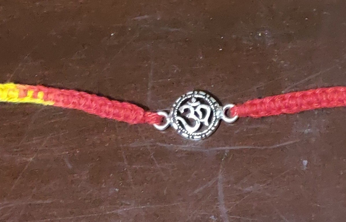 Silver OM rakhi