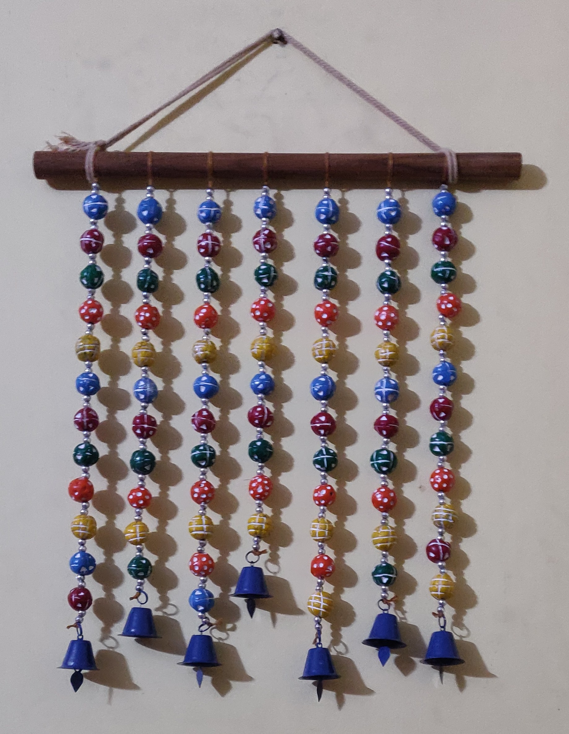 Handmade wall hanging with round Beads with metal bells