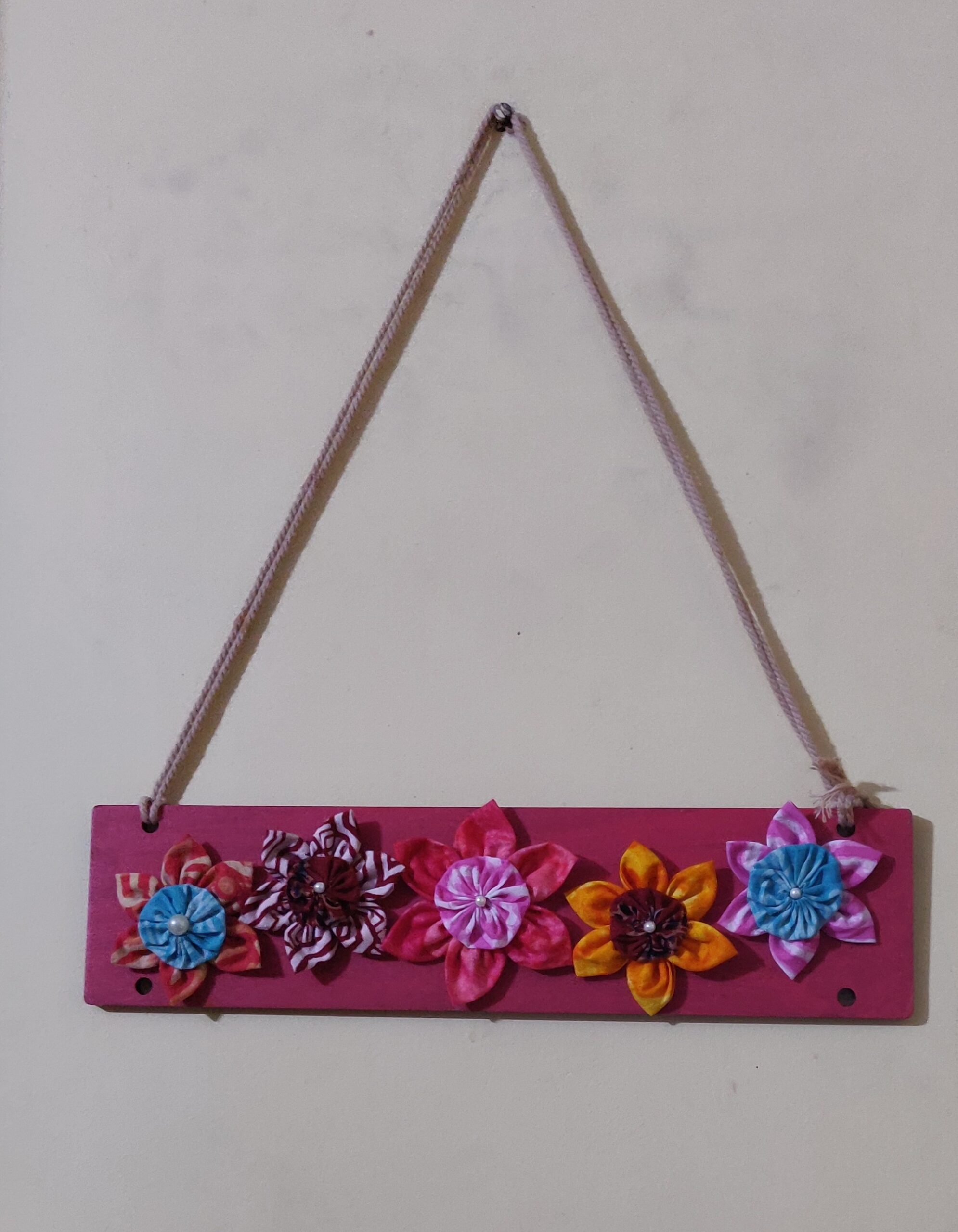 Handmade wooden flank and with fabric flowers