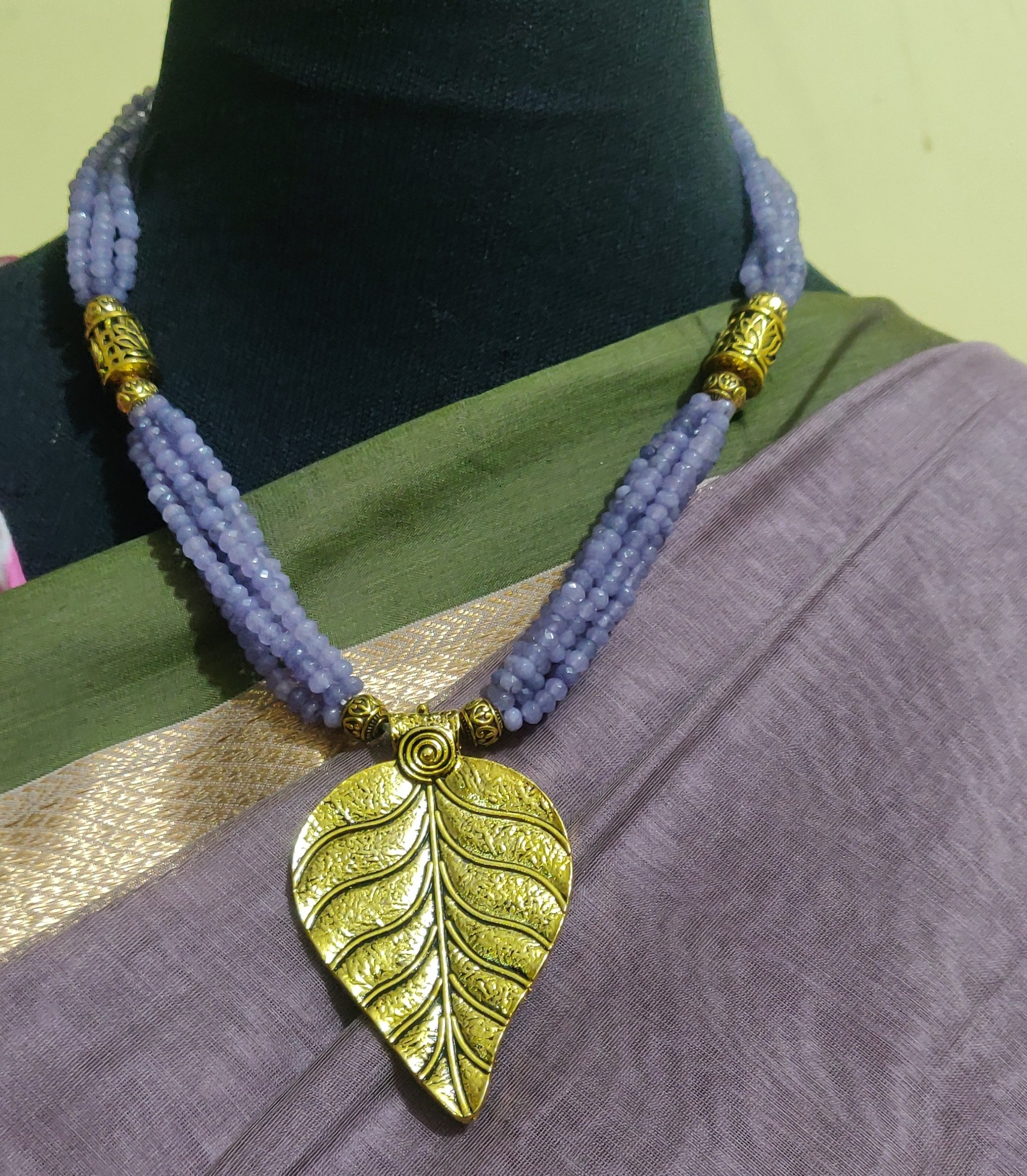 Layered agate cut beads with antique pendant necklace