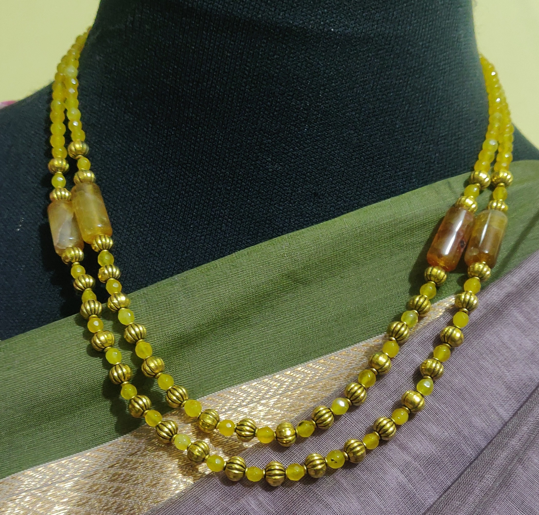 Layered Zed cut yellow beads with antique beads necklace