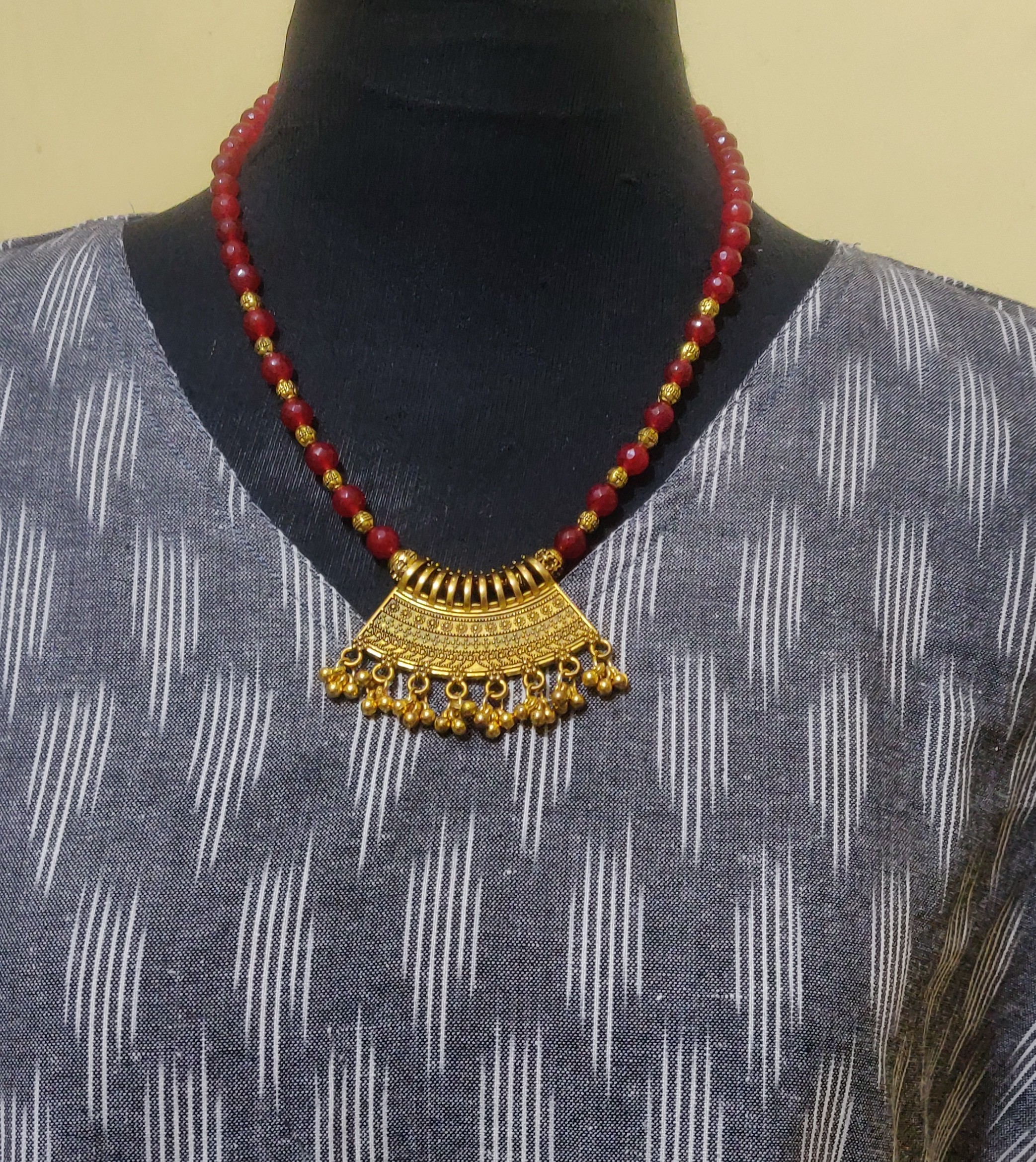 Semiprecious beads with brass beads and pendant