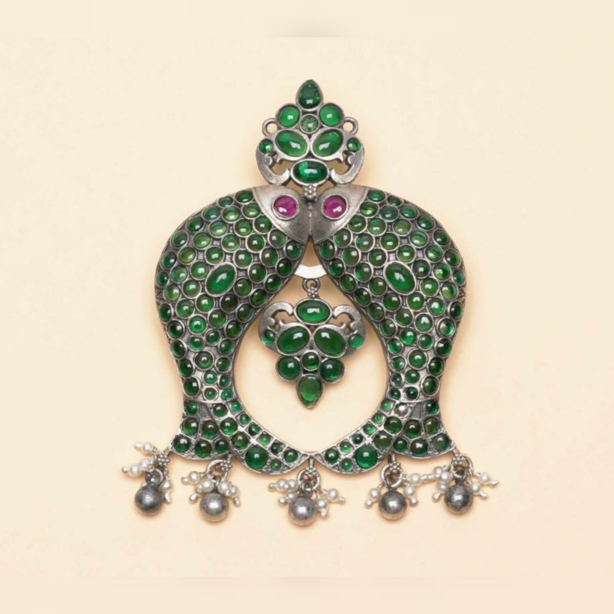 Beautiful fishes pendant with green stones