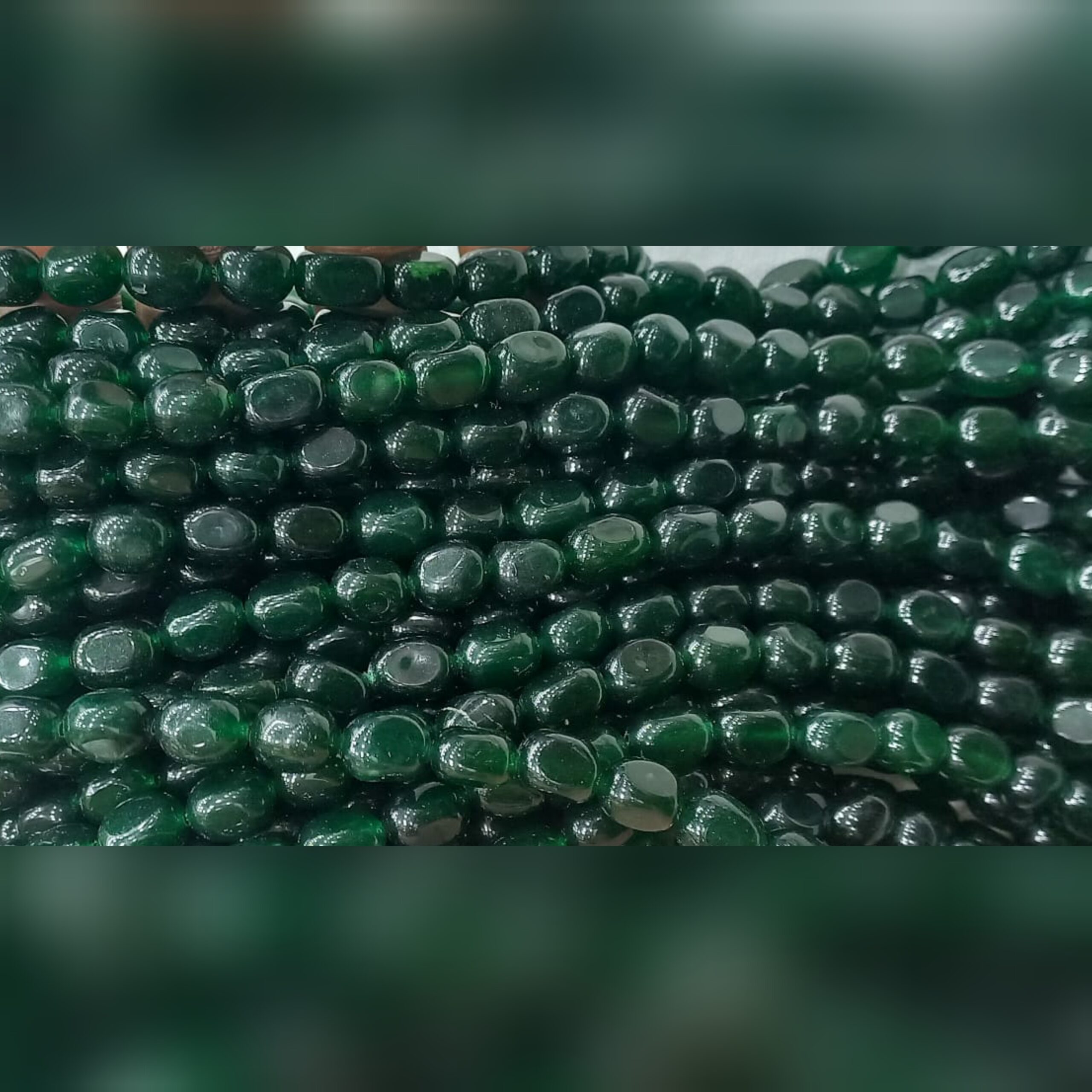 Semi-precious tumbler beads string.