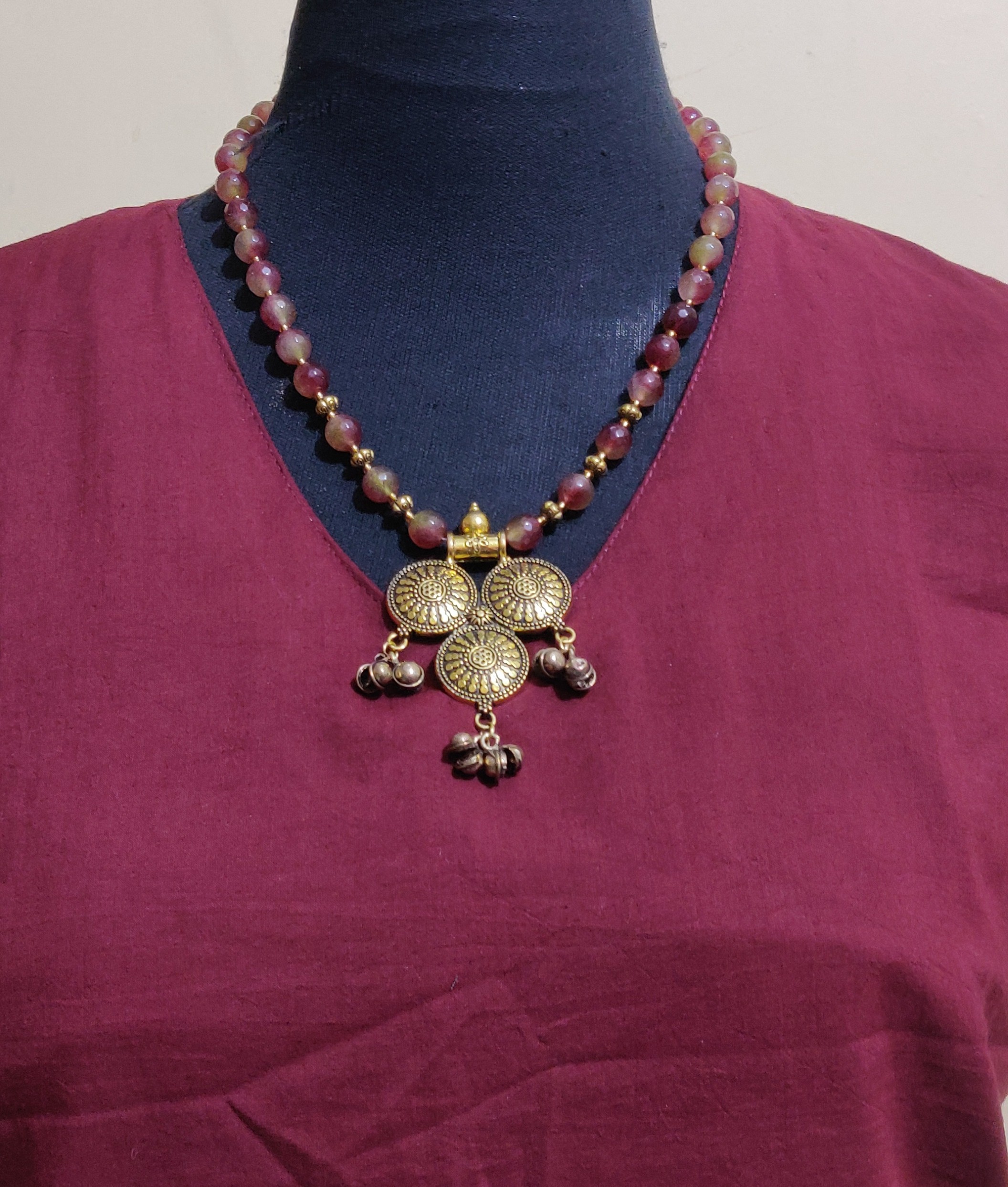 Semi-precious beads and antique pendant