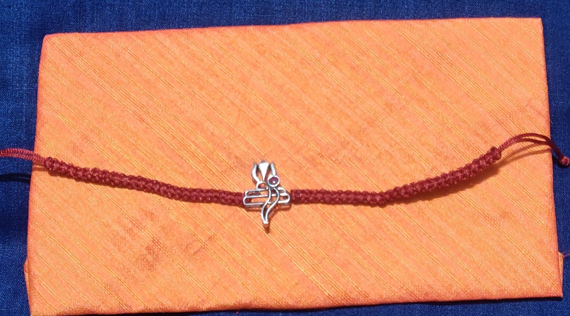 Silver rakhi
