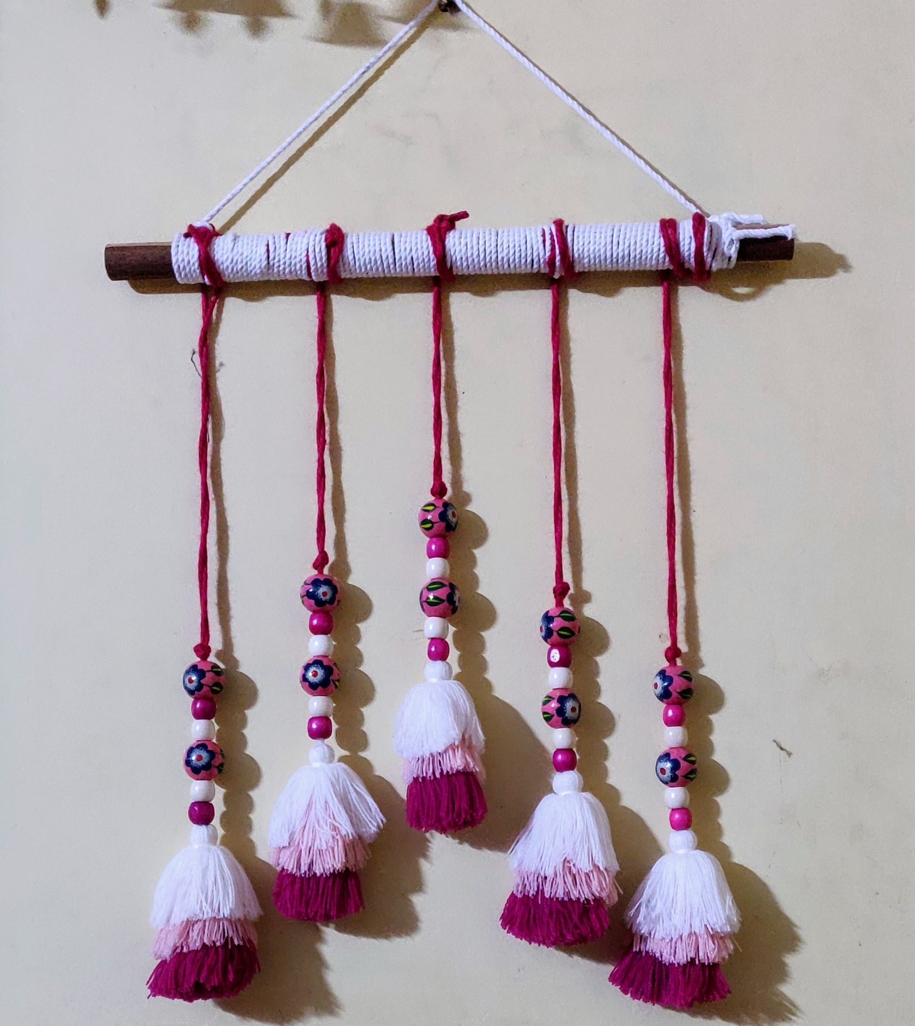 Wall hanging with wooden beads and cotton thread hangings
