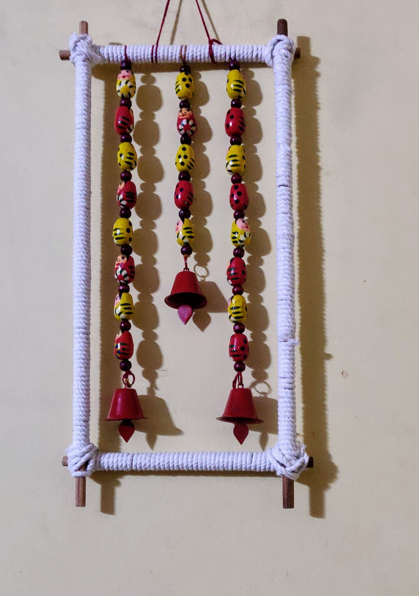 Wooden hand painted doll beads wall hanging