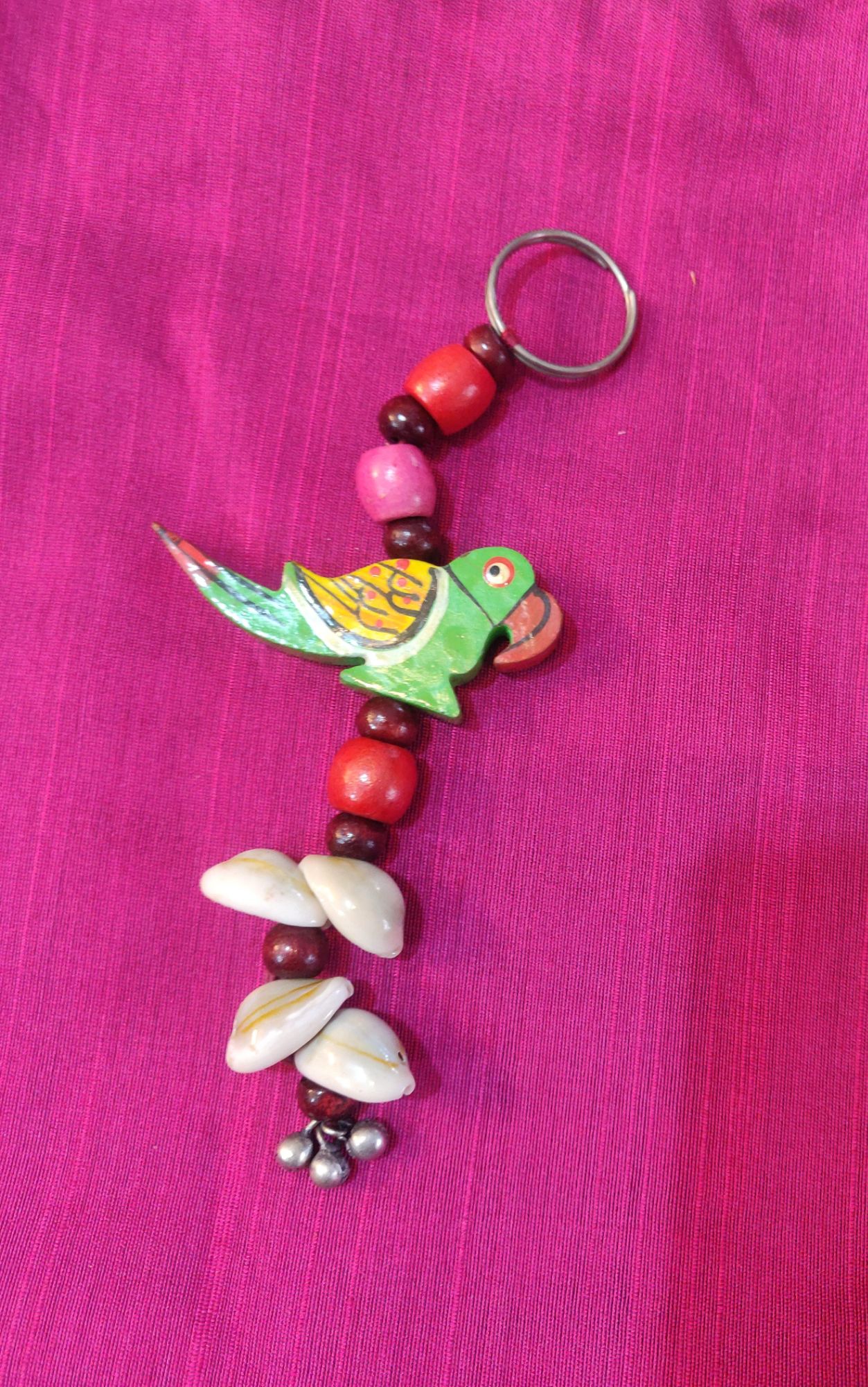 Hand painted wooden beads and green parrot key chain