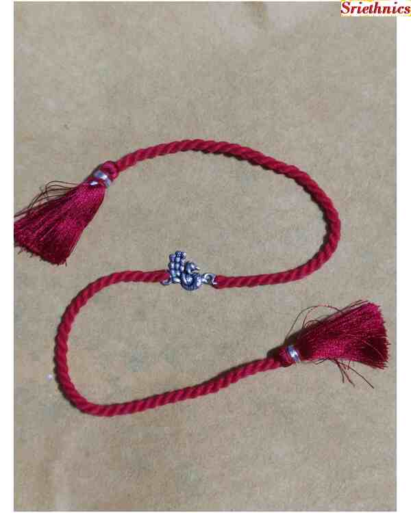 Pure silver peacock rakhi