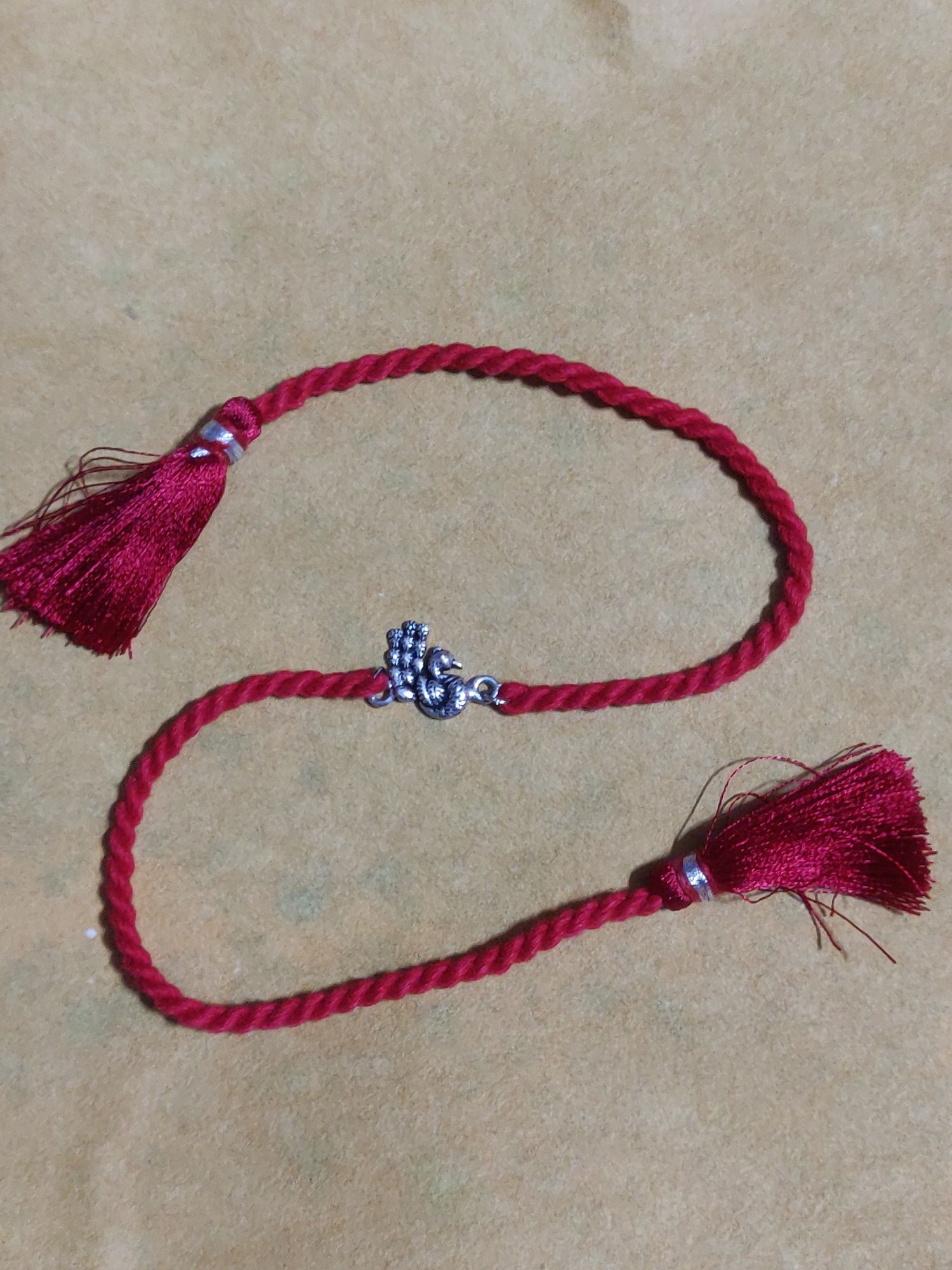 Pure silver peacock rakhi
