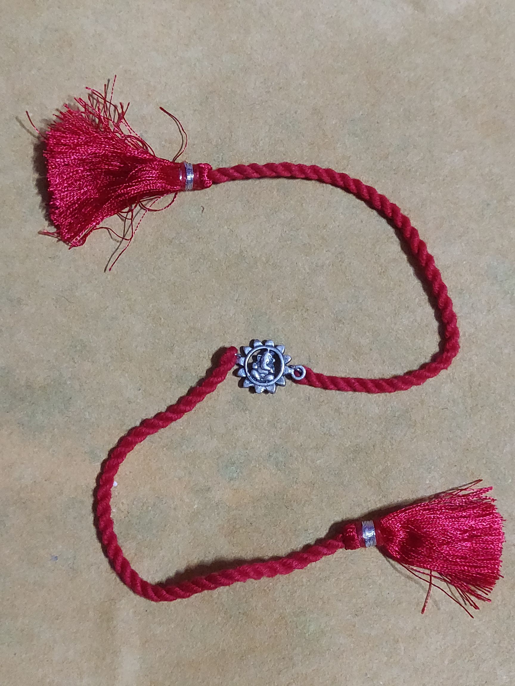 Pure silver sunflower Ganapati rakhi