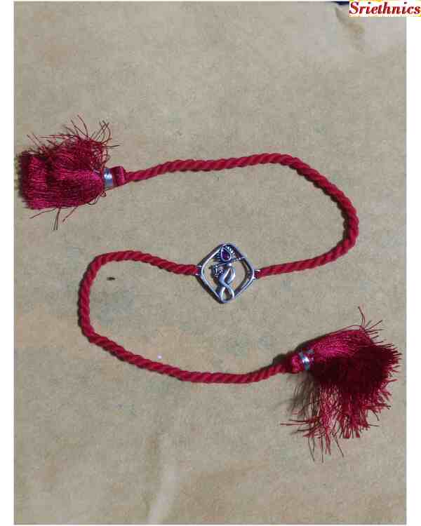 Pure silver murali rakhi